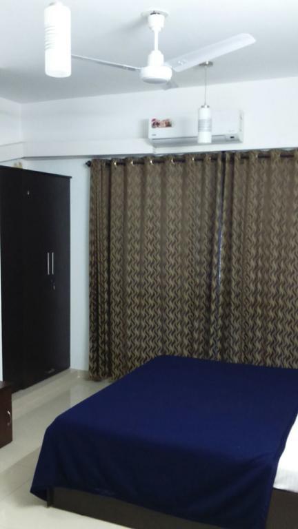 Ashiana Apartment Мумбаи Номер фото